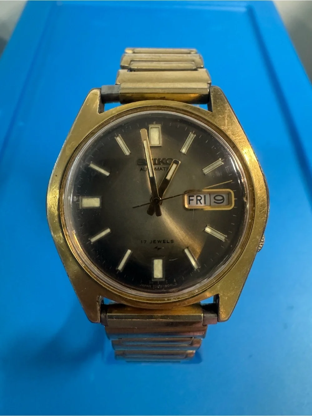 Seiko Gold Tone Watch with Black Dial and Day-Date